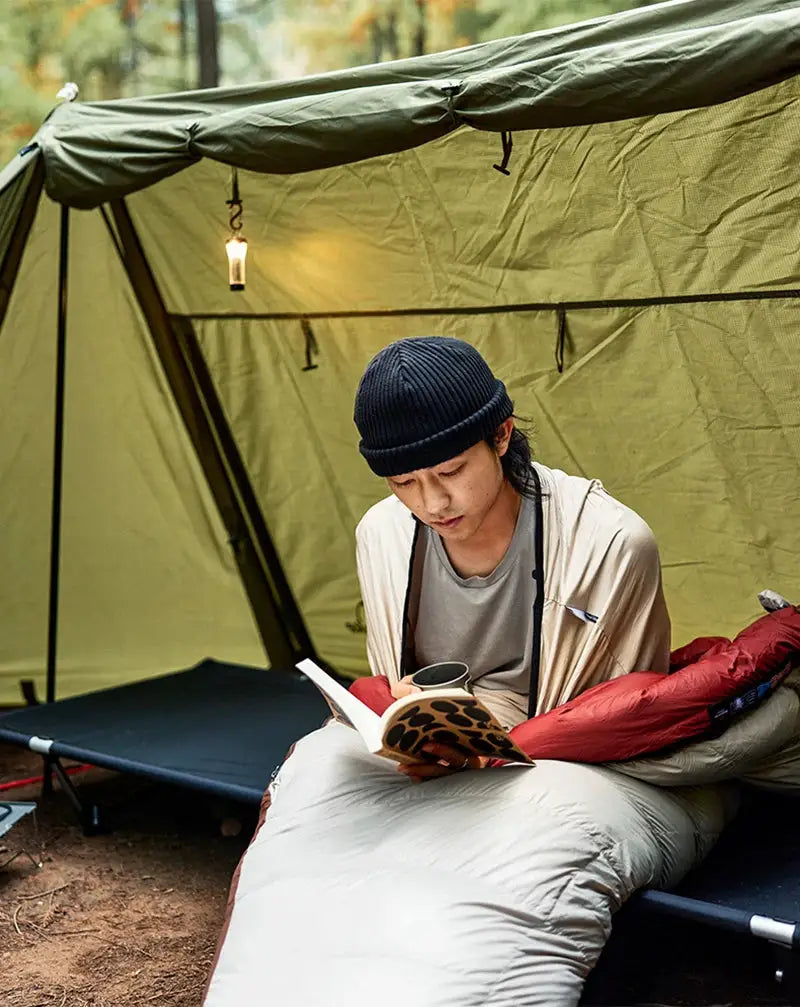 Naturehike ultralight mummy sleeping bag liner by Simples Market, light gray, wearable quilt inside a camping tent.