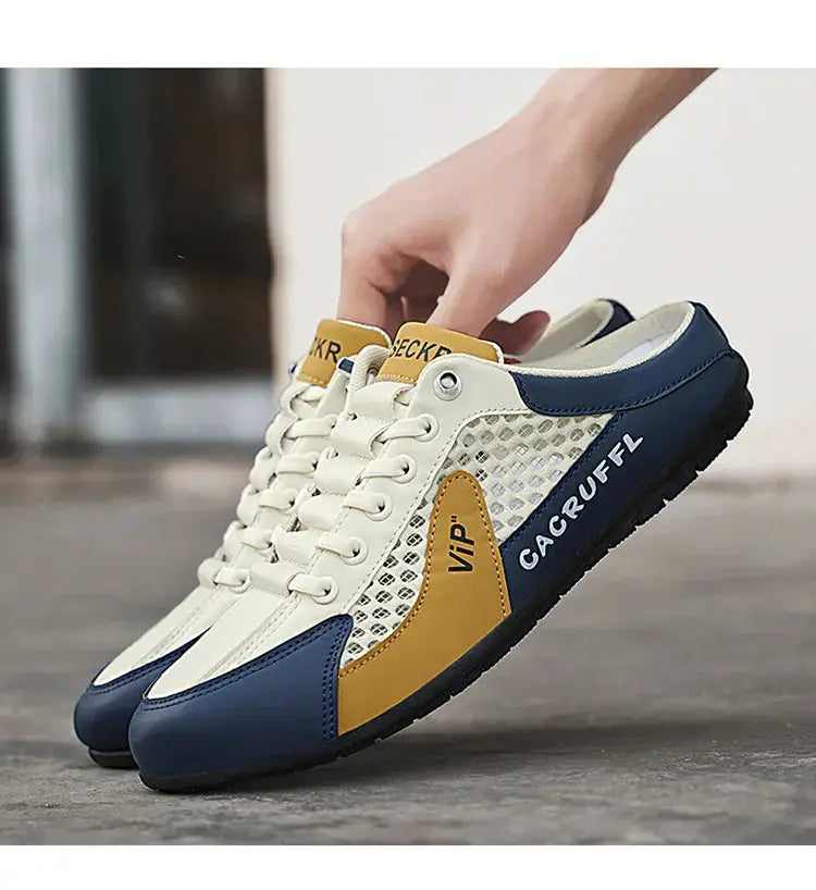 Men's casual slip-on sneakers with white mesh, blue toe/heel accents, and yellow side panels.