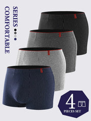 4-piece set of men's striped boxer briefs in navy, gray, light gray and black with red waistband tags