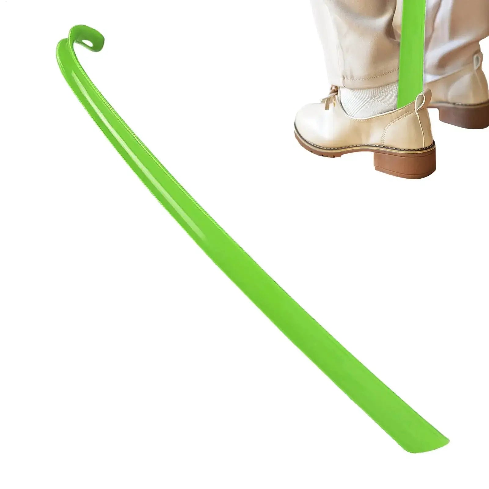 Plastic extra-long green shoehorn; eases putting on shoes, shown with beige boots
