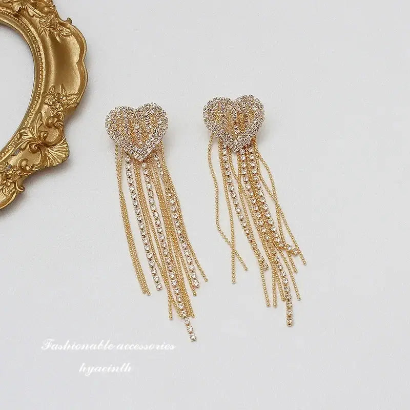 Gold-tone zinc alloy stud earrings, pair, with crystal-heart tops and long dangling chain strands