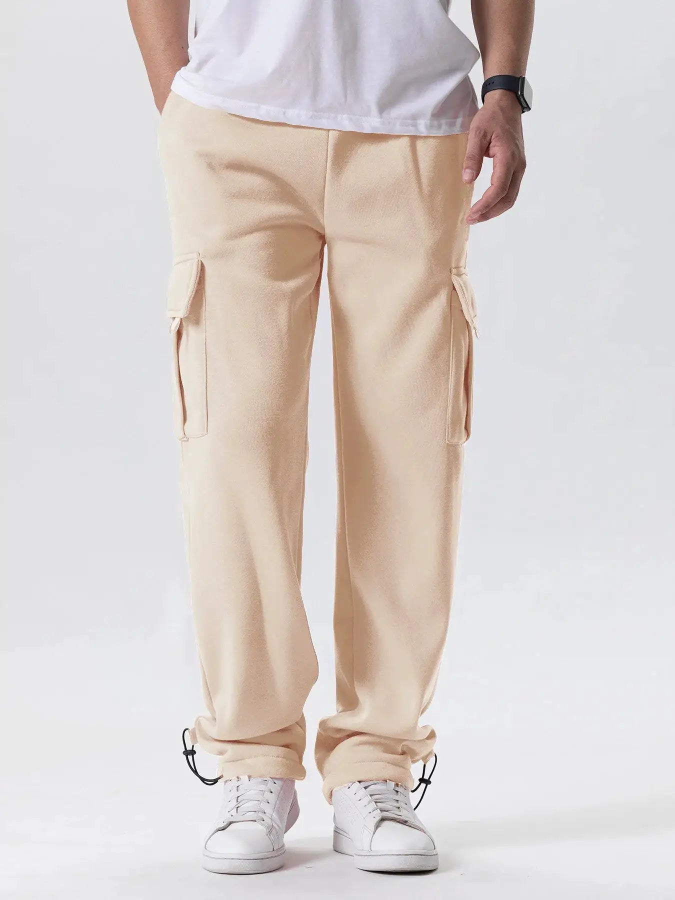 Men's beige cargo sweatpants with straight fit, multiple pockets and drawstring ankle cuffs.