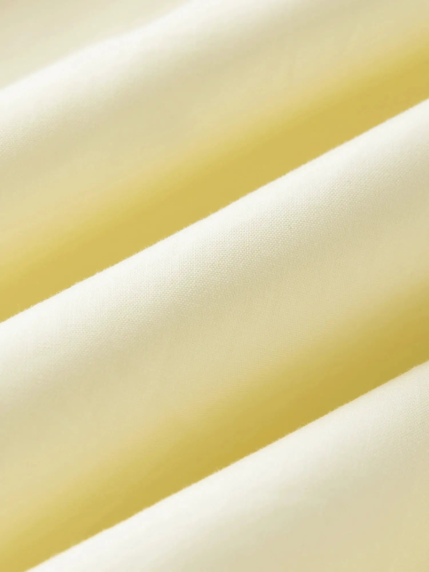 FSLE Premium Series cotton shirt fabric close-up; pale yellow and cream striped textile