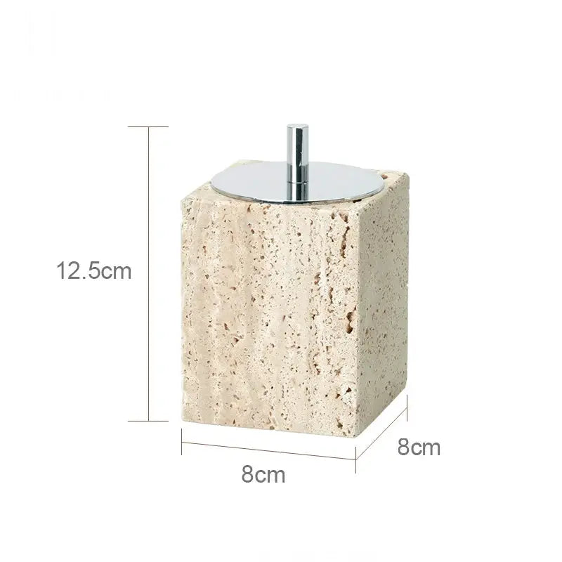 Beige travertine soap dispenser with chrome pump, 12.5 cm tall.