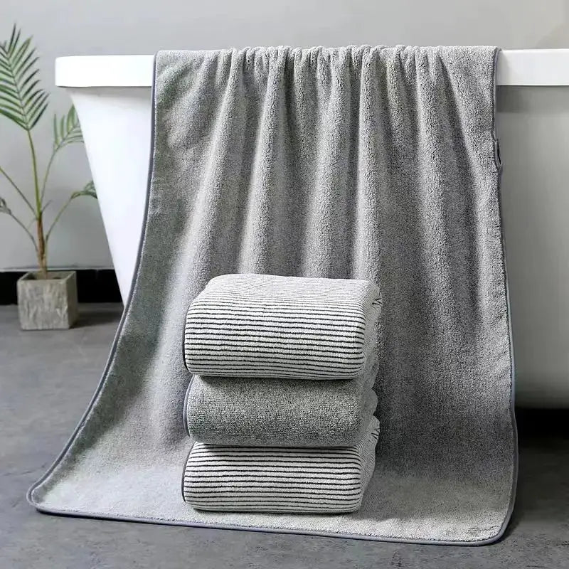 4-piece bamboo towel set from Simples Market in gray with striped hand towels