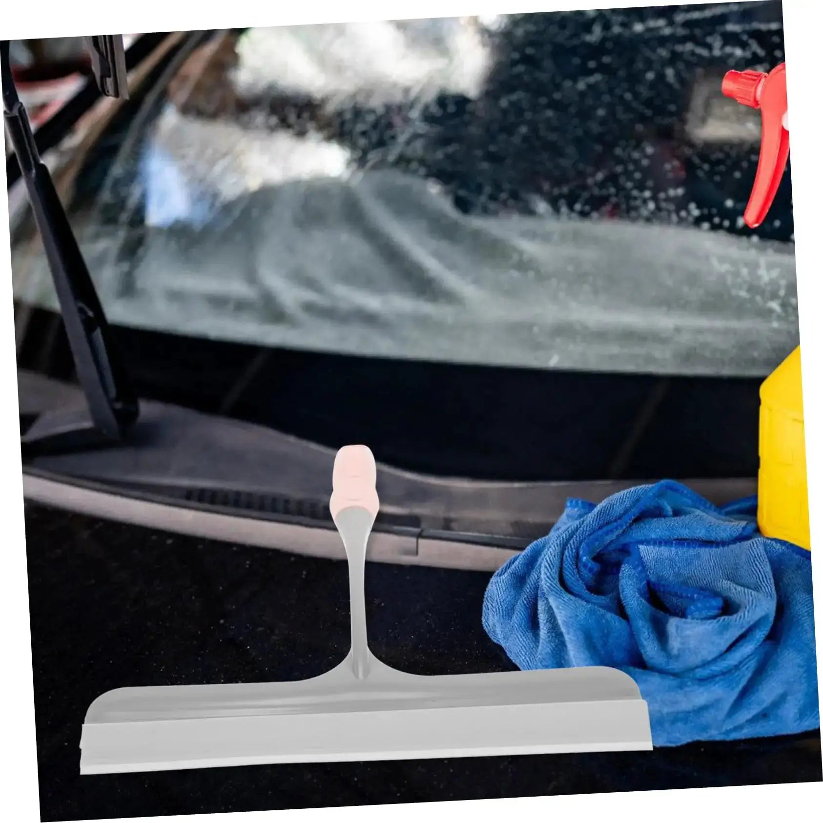 Simples Market silicone scraper wiper for windows and glass; white/gray body with blue towel nearby.