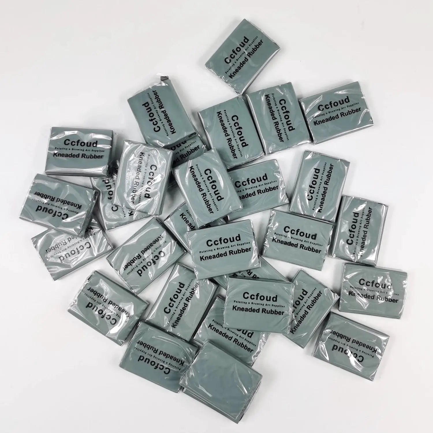 Kneaded rubber erasers in grey packaging by Ccfound; multiple packs for blending, shading, sketching.