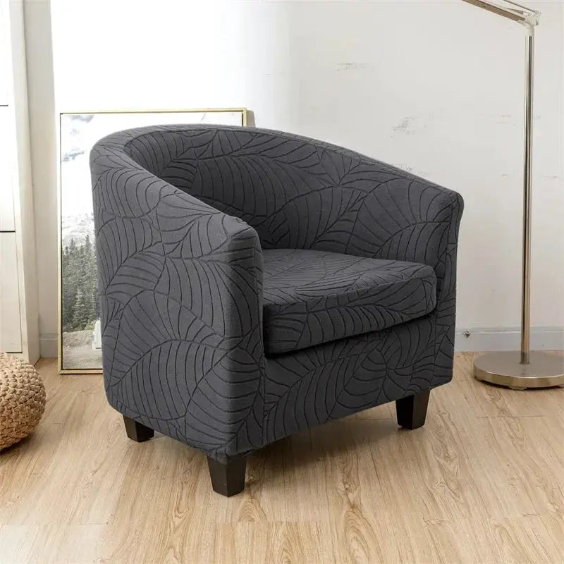 Leaves Jacquard tub chair slipcover in dark gray fabric by Simples Market for living room