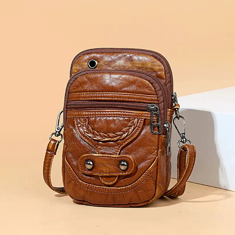 Brown PU leather women messenger bag with braided front detail and adjustable crossbody strap