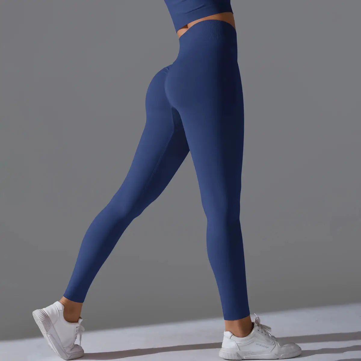 Women's seamless yoga leggings in blue with a high-waist tummy control and scrunch butt lift