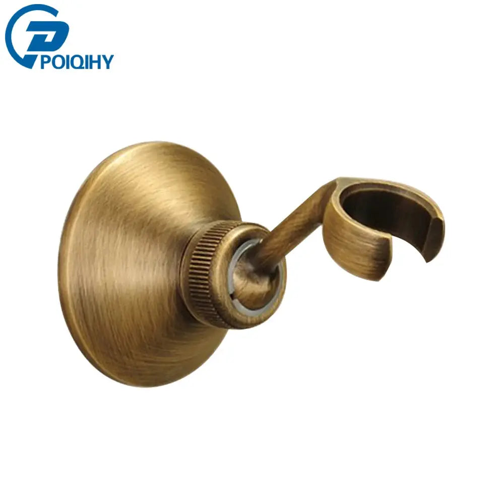 Antique brass handheld shower wall bracket with curved holder and round backplate