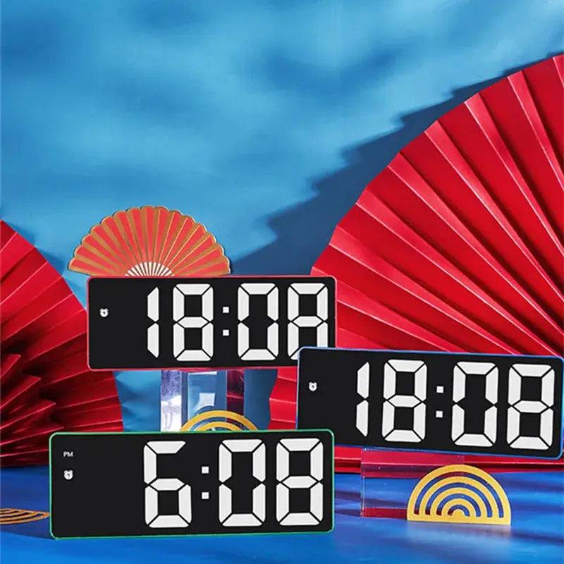 Three acrylic/mirror digital LED alarm clocks with voice control and night mode.