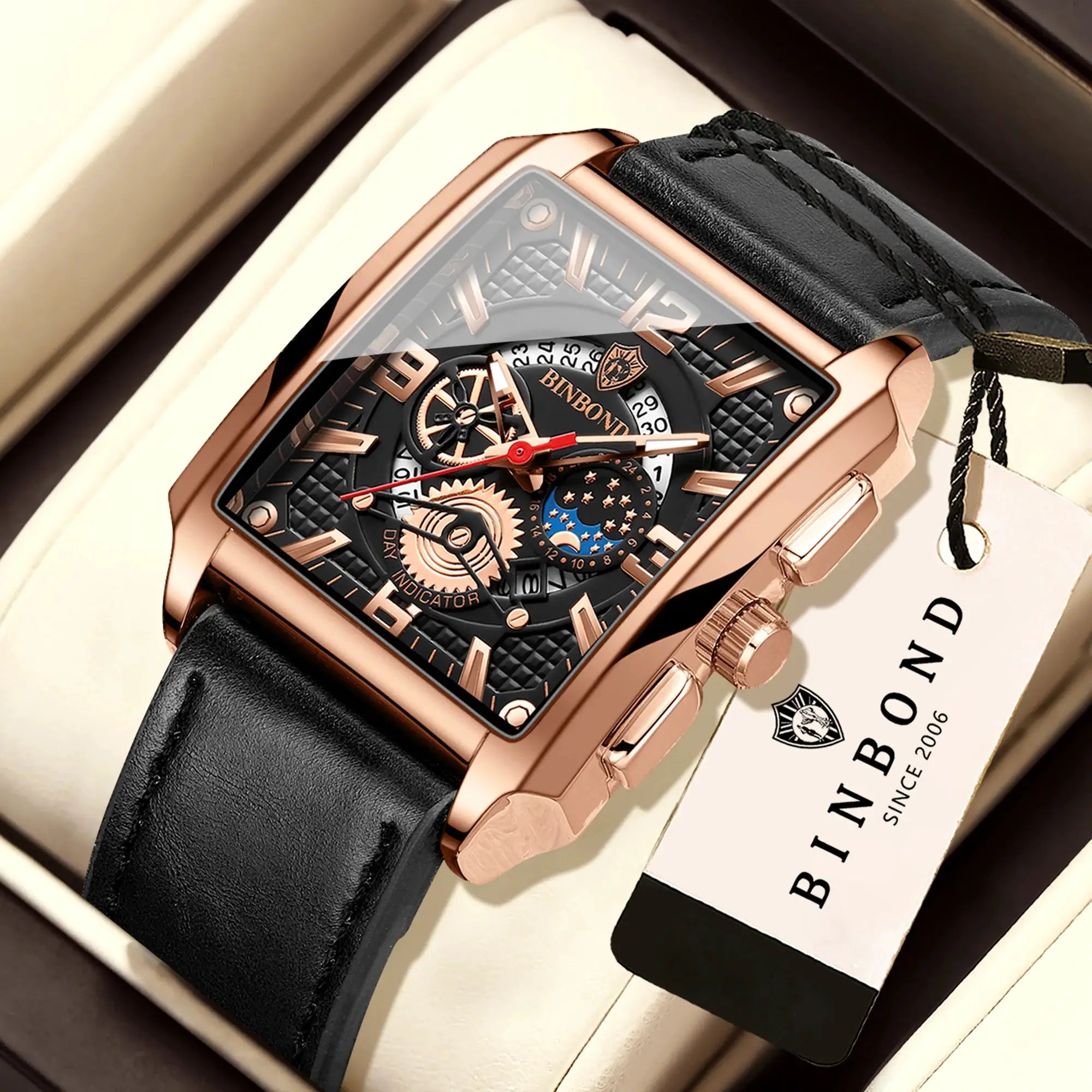 BINBOND men's watch with rose-gold rectangular case, black leather strap, and skeleton dial.