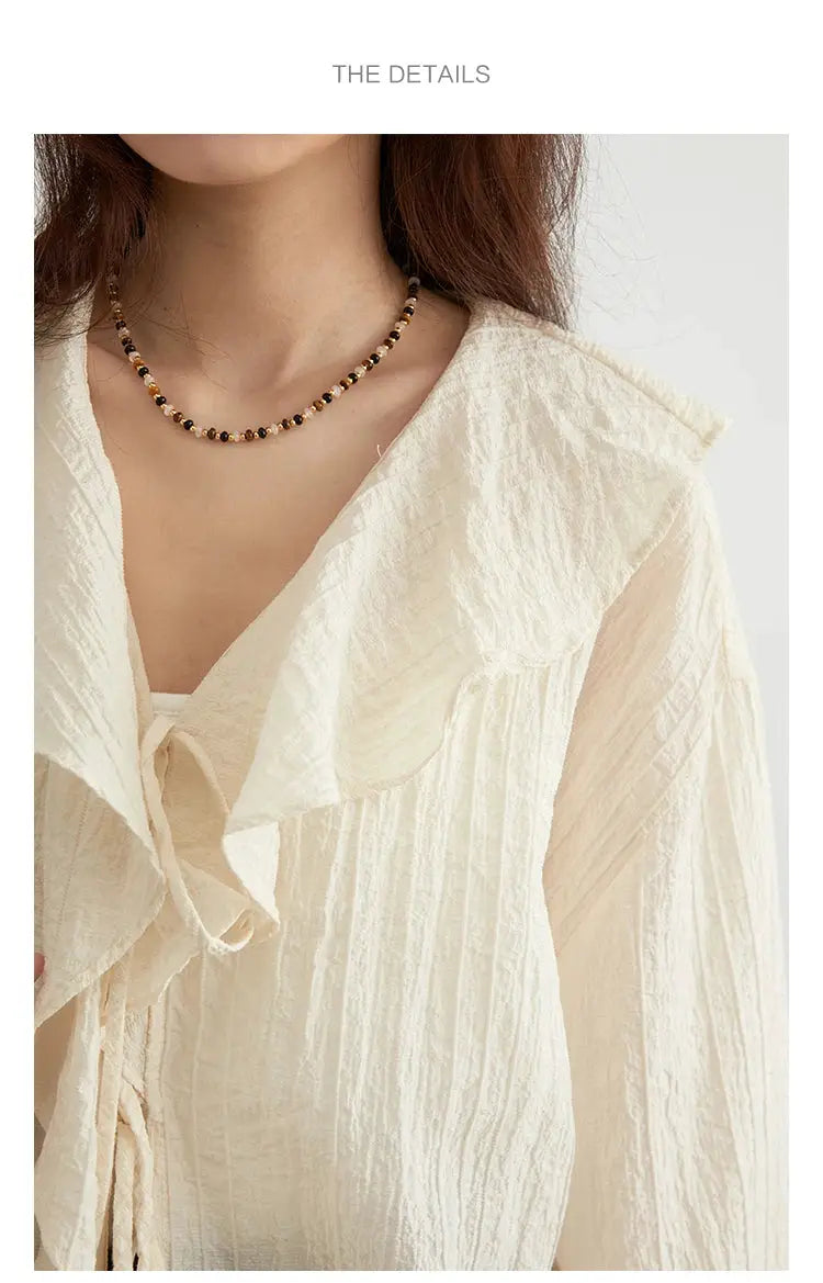 CHIC VEN women's ivory textured blouse with lace-up V-neck and ruffled edges, loose fit
