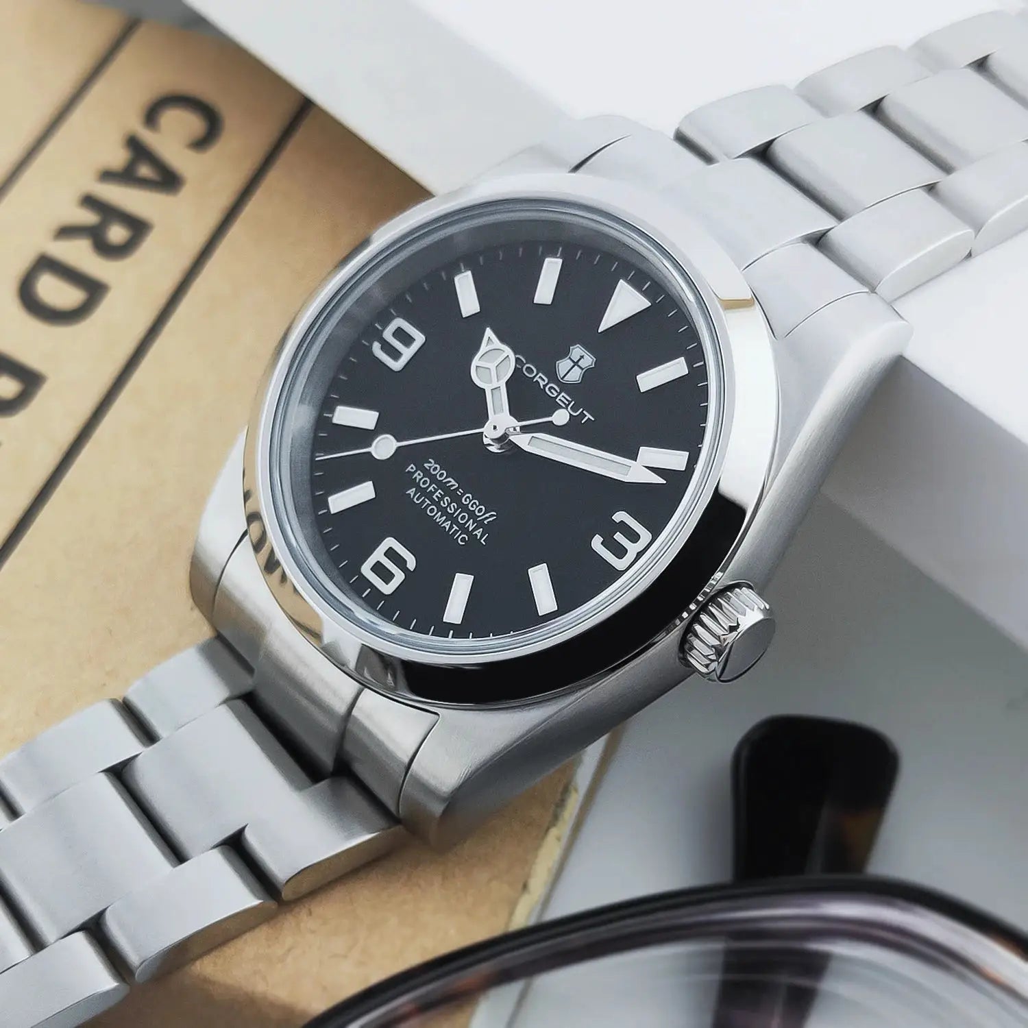 Corgeut men's automatic wristwatch with black dial and stainless steel bracelet