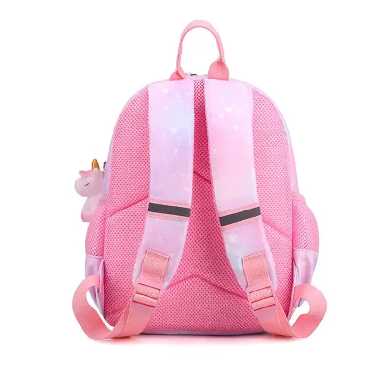 Pink unicorn backpack for girls with pastel pink straps and unicorn charm