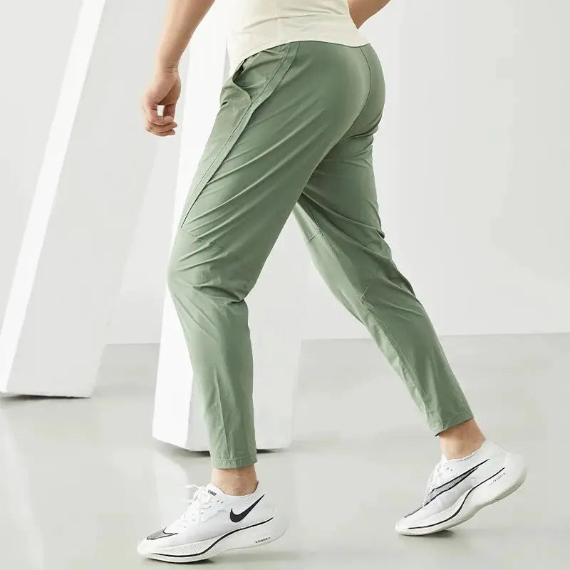 Men's running pants olive green lightweight quick-dry tracksuit trousers with side pockets by Simples Market