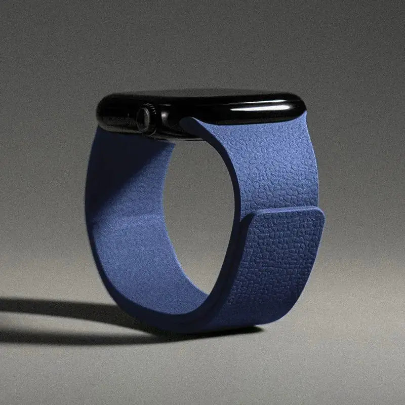Blue silicone magnetic Apple Watch strap, fits 40–49mm sizes.