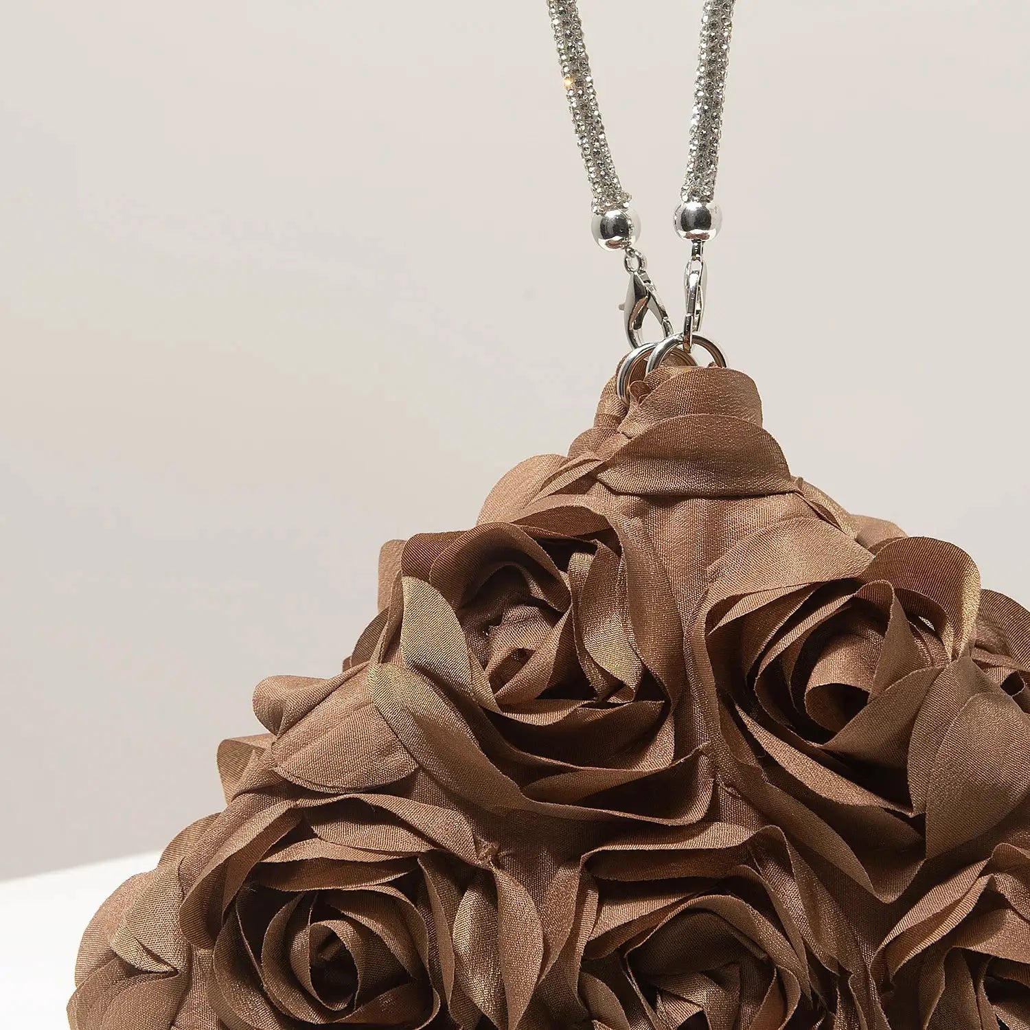 Mini purse charm featuring brown fabric rose cluster on a silver chain by Simples Market