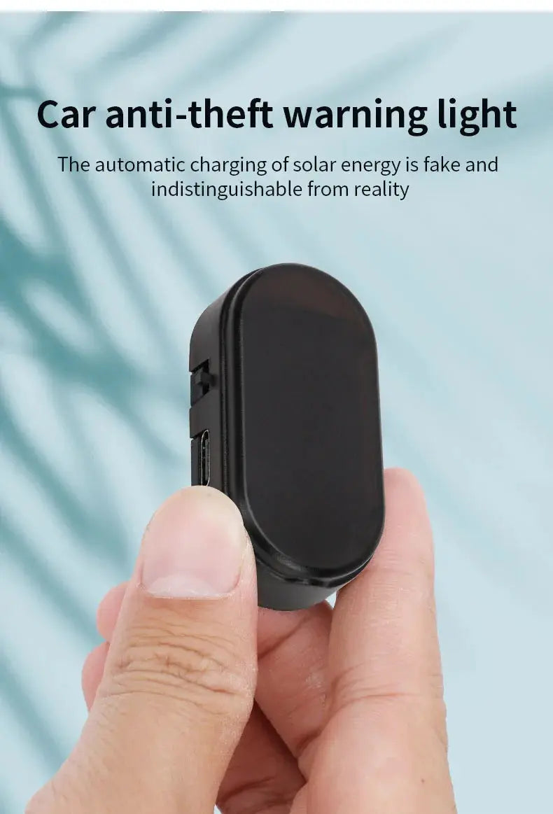 Car anti-theft warning light, black oval handheld device with simulated flashing signal
