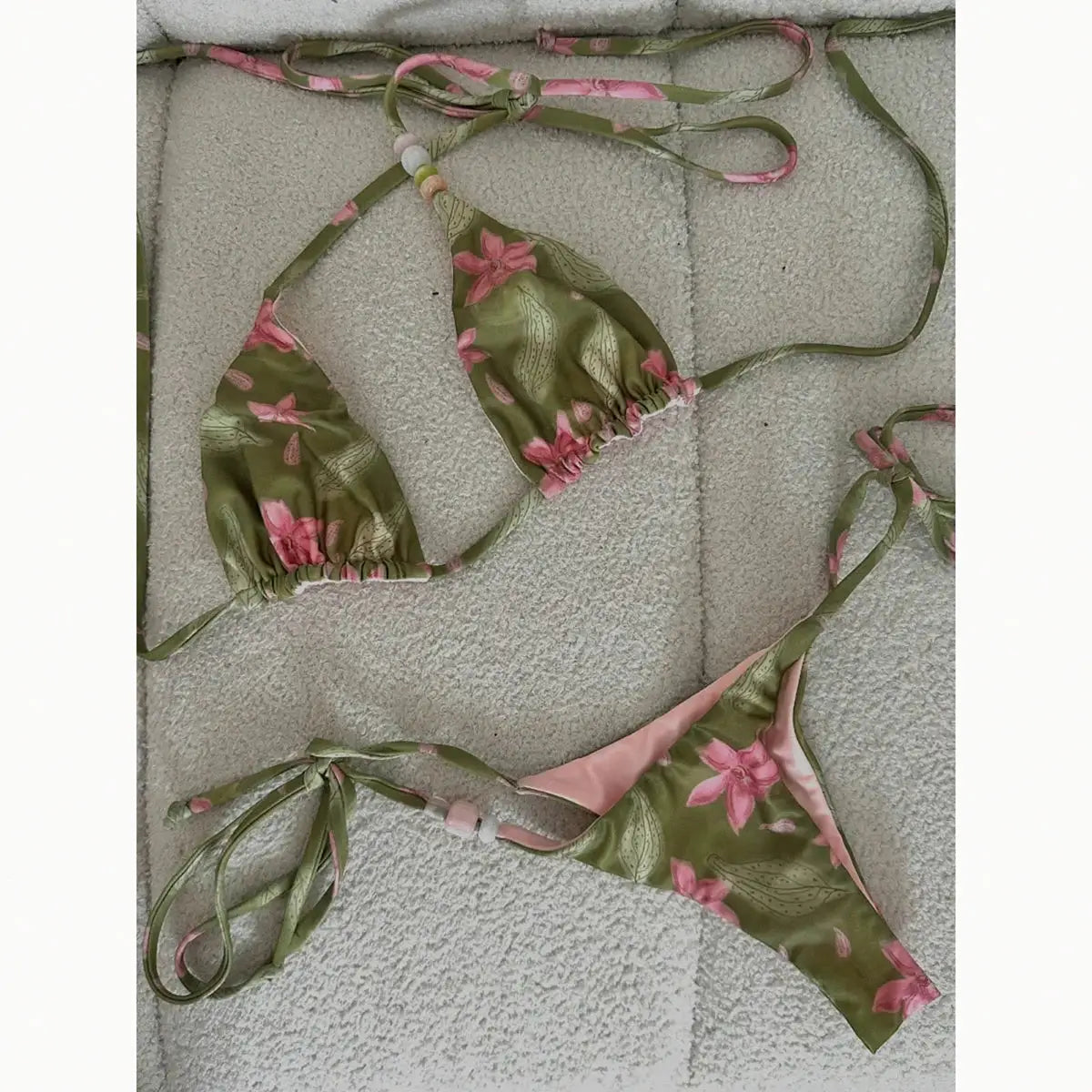 Floral green 2-piece micro bikini set with pink blossoms; triangle top and thong bottom, Simples Market