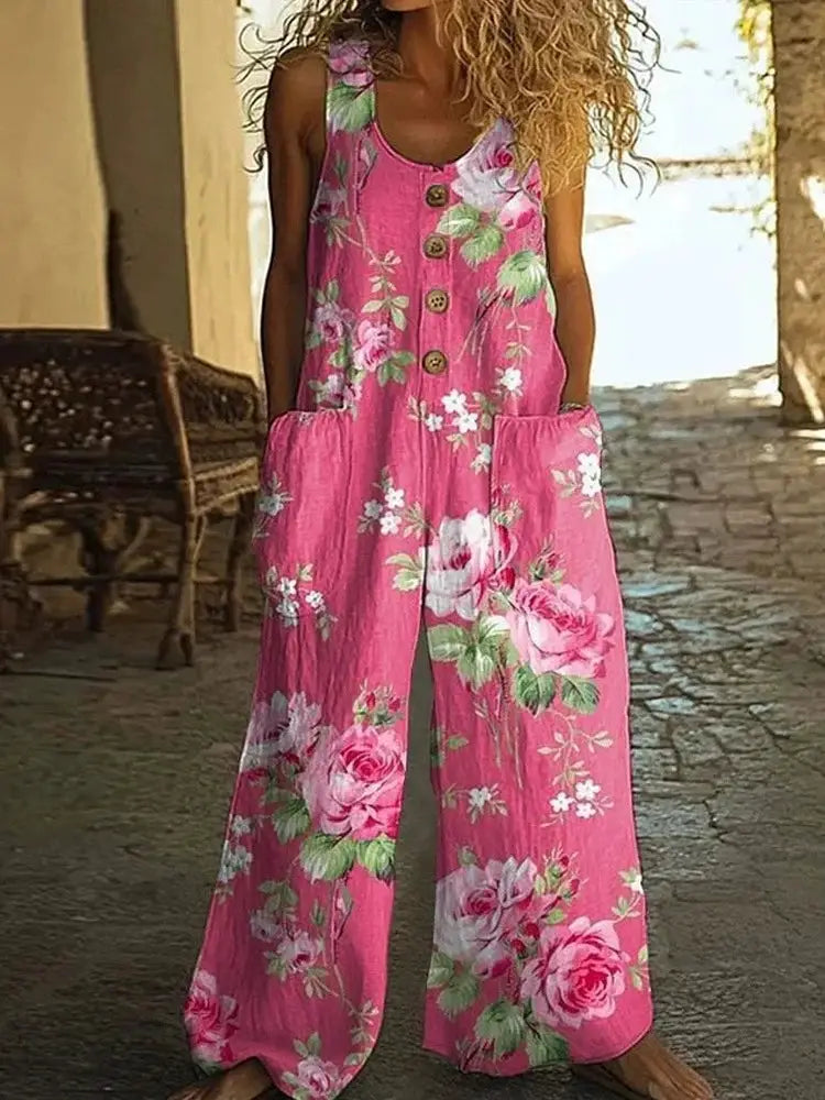 Jumpsuit pink floral print sleeveless with button front, wide legs and pockets