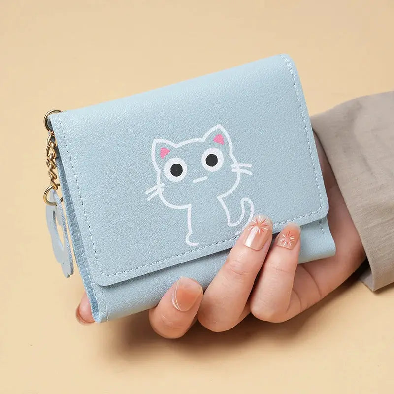 Short-style purse wallet in light blue by Simples Market with cute cat illustration and multi-card slots