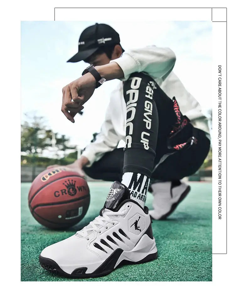 Men's white and black high-top sneakers with Jumpman logo on a green outdoor basketball court.