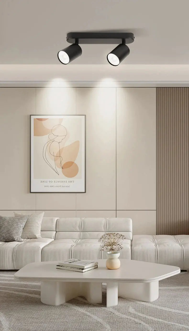 Simples Market LED ceiling spot lamp with two black GU10 spotlights in a modern living room