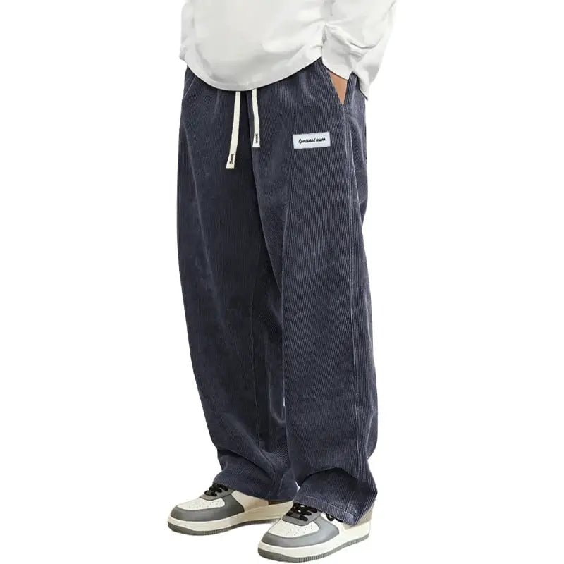 Men's dark blue corduroy loose-fit baggy pants with elastic drawstring waist