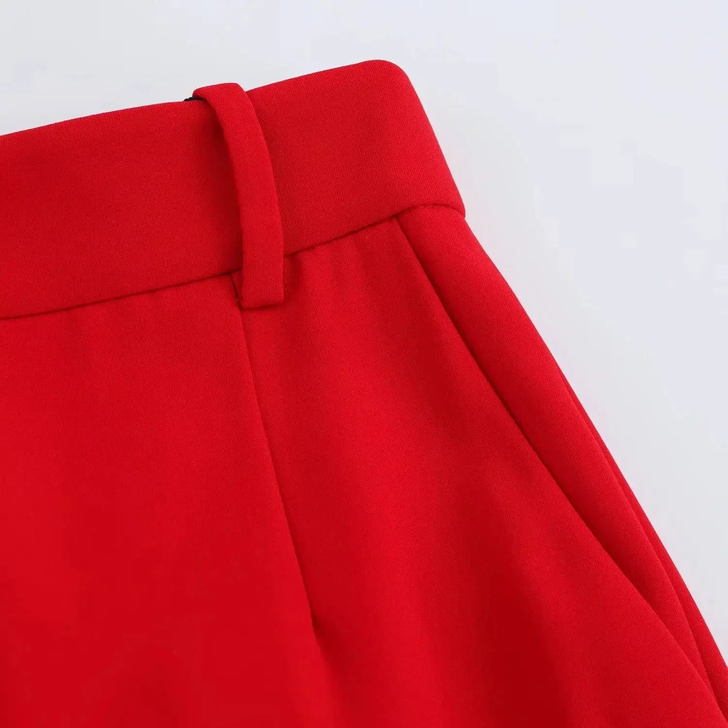 KONDALA red sleeveless blazer close-up with shoulder strap detail