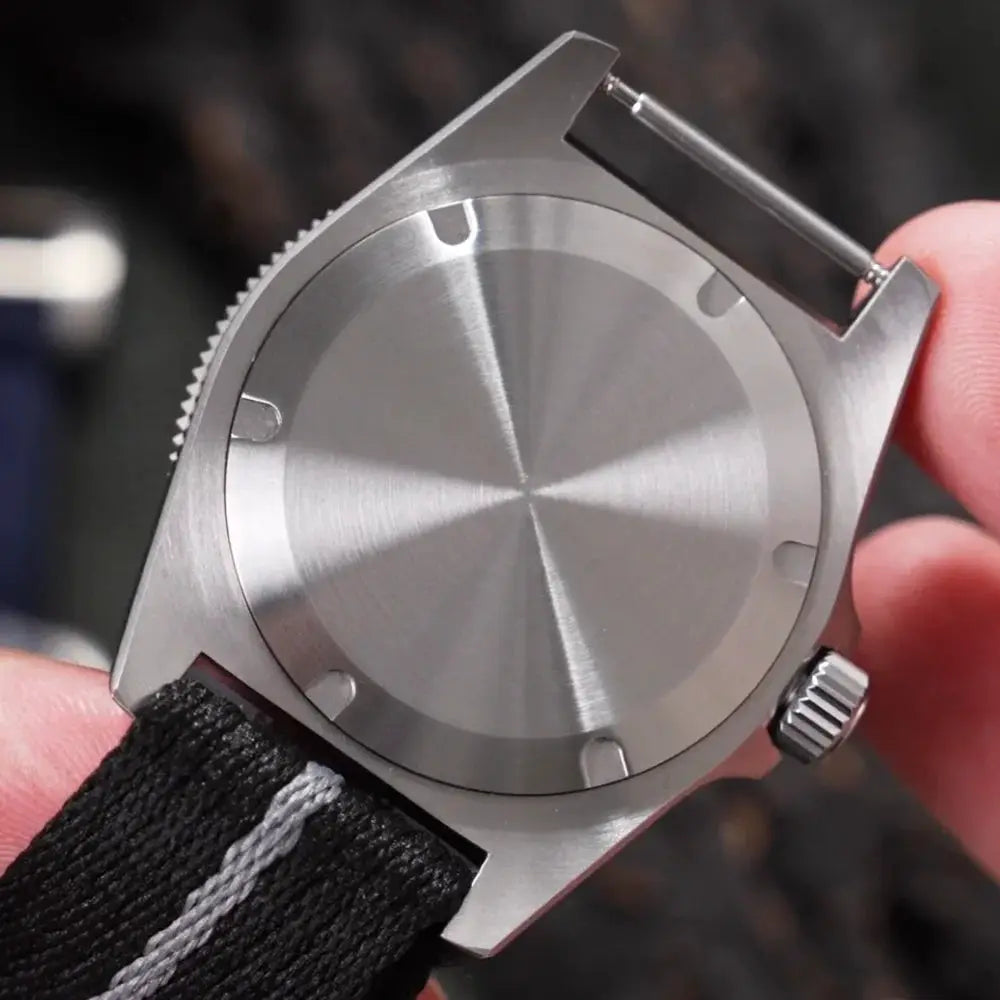 Watchdives EXD 40mm titanium dive watch back view with brushed titanium case and black fabric strap