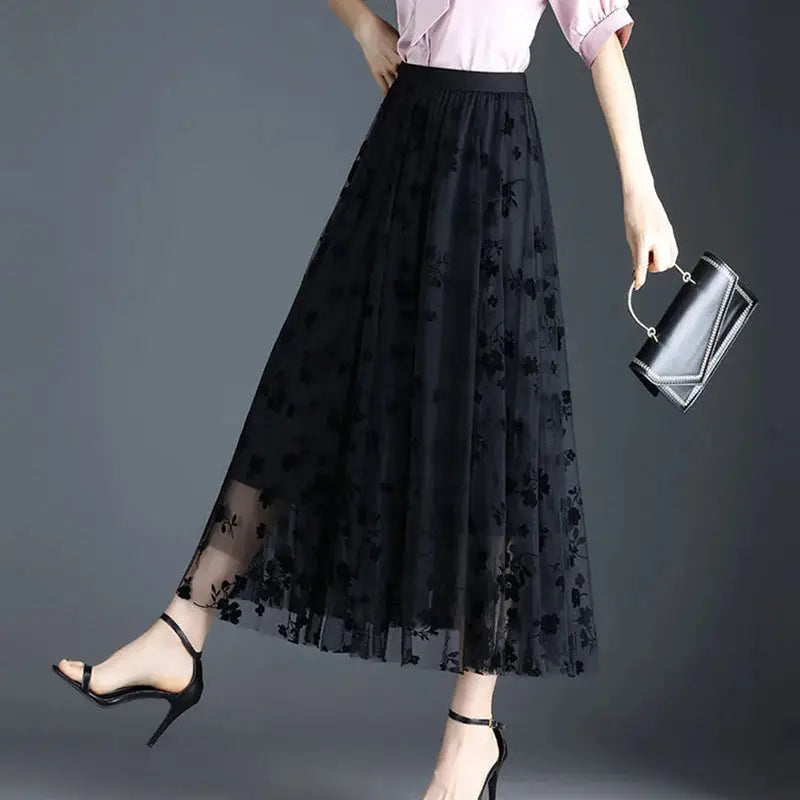 Korean women's black floral tulle midi skirt with mesh overlay by Simples Market