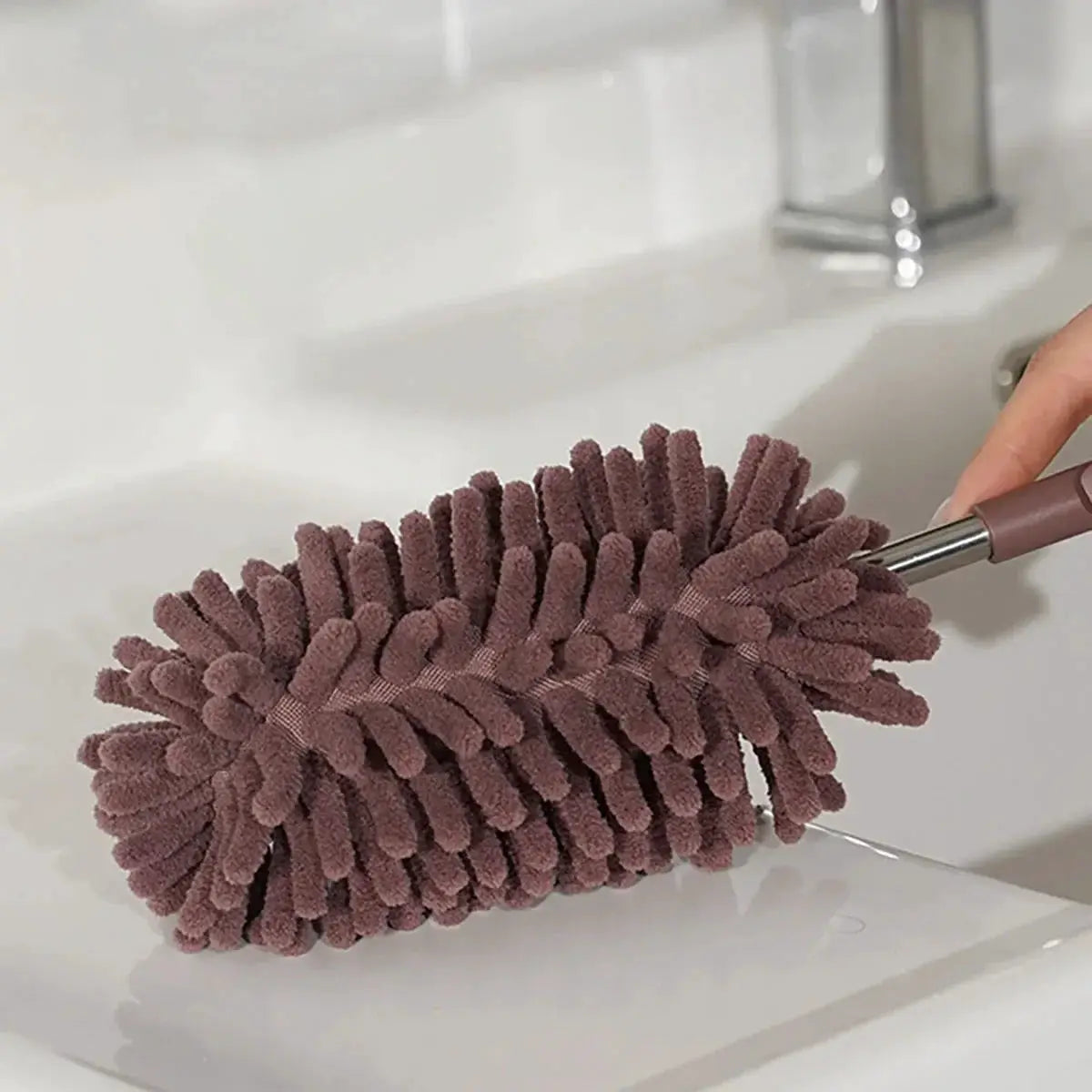 Mini car duster brush with extendable bendable handle; purple polyester microfiber head by Simples Market.