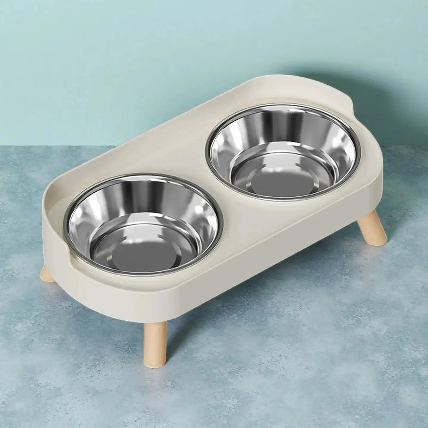 Dual stainless steel bowls feeding station with neck support, beige elevated stand by Simples Market