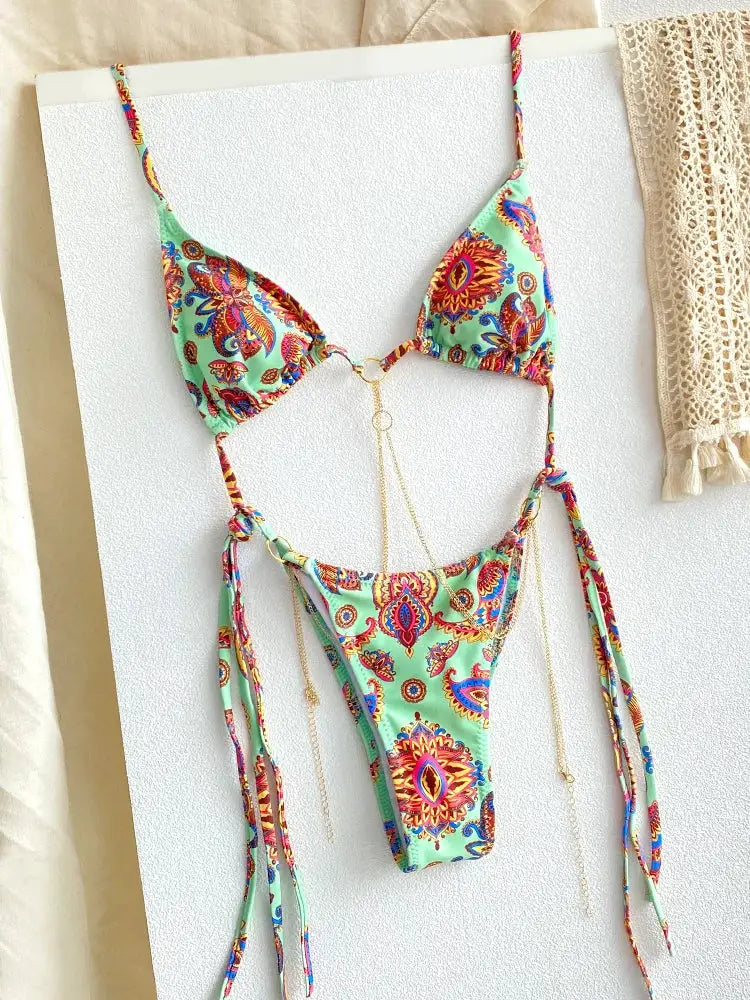 Sexy triangle chain bikini set with turquoise multicolor paisley print, gold chain accents, thong bottom