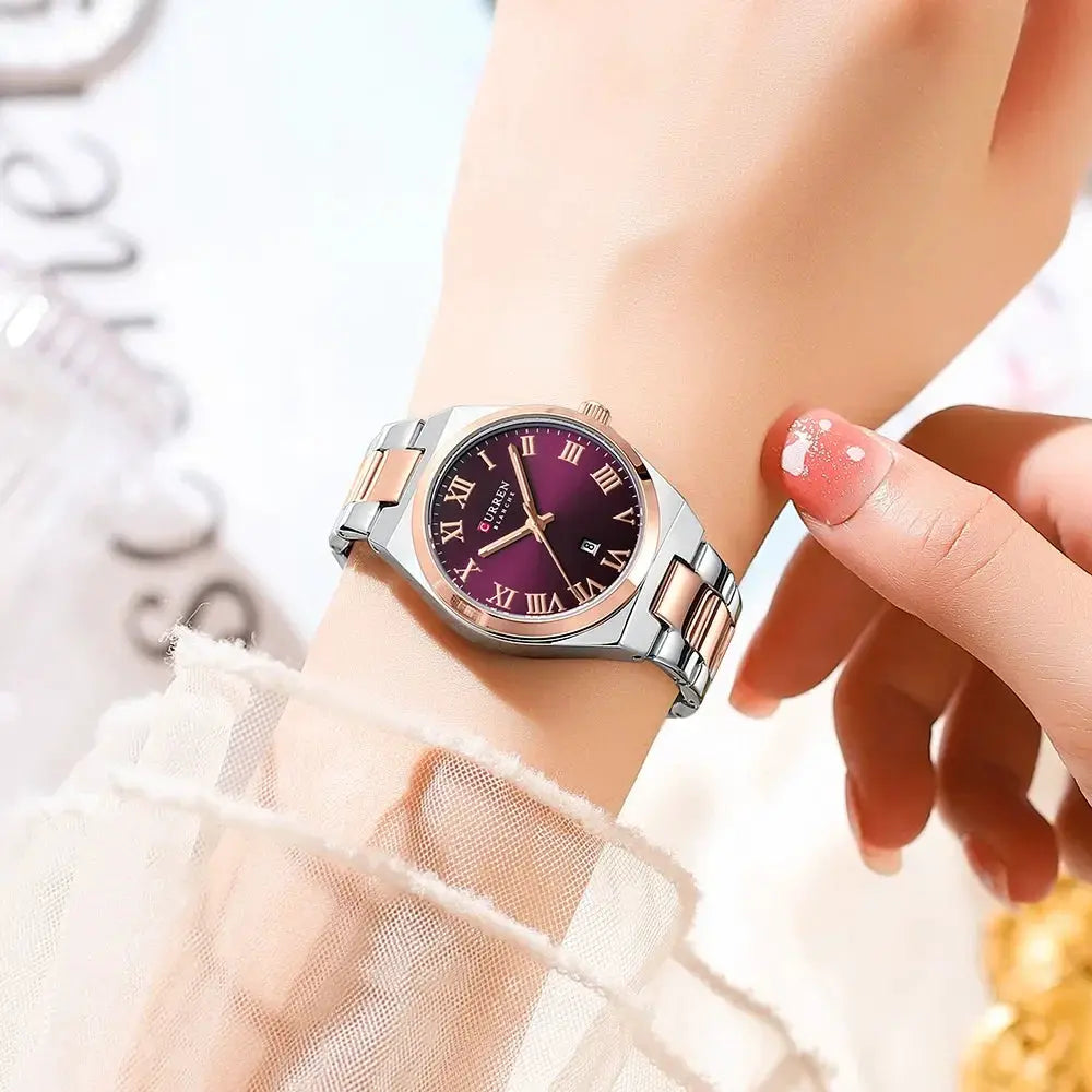 Curren women's watch with purple dial, two-tone stainless steel and rose-gold bracelet, analog with Roman numerals and date