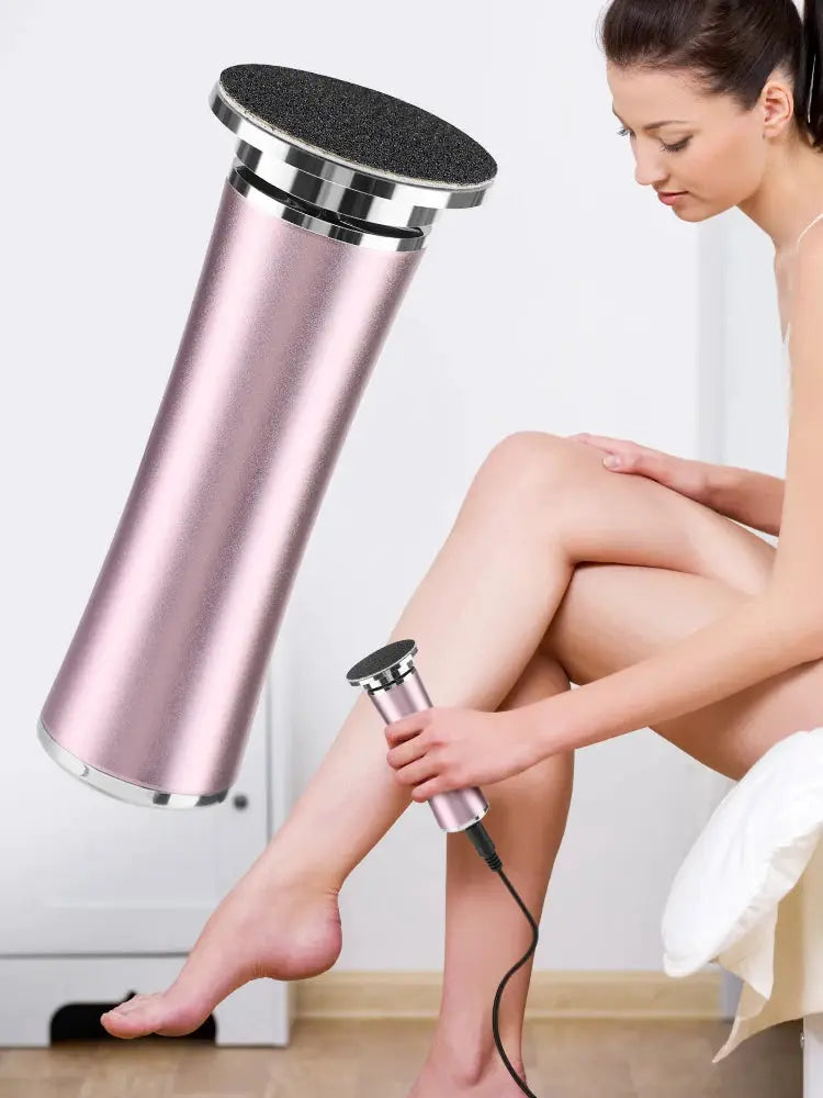 Simples Market electric foot callus remover in pink metallic with sanding pad; two handheld pedicure tools shown.