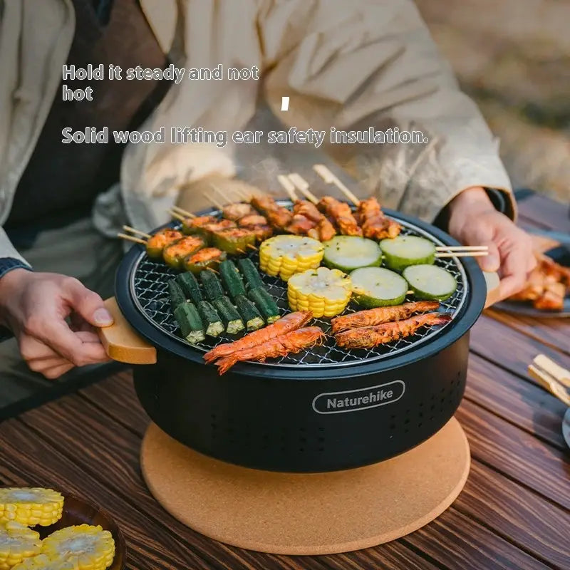 Naturehike tabletop charcoal BBQ stove with wooden handles for outdoor camping