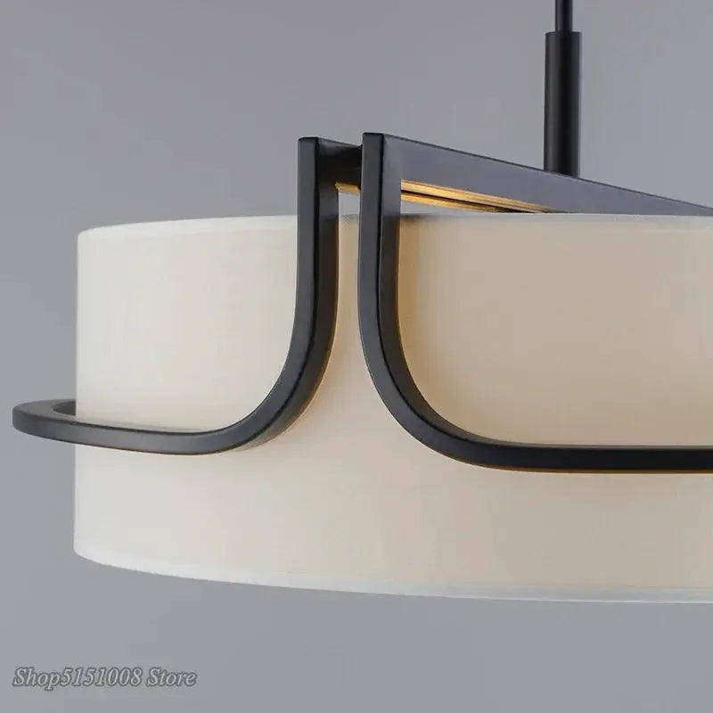 Simples Market modern fabric art ceiling chandelier with black metal arches and white drum shade.