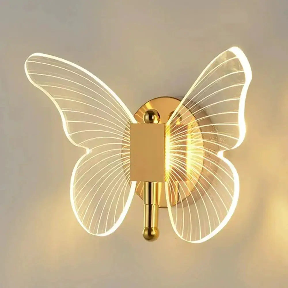 Butterfly LED wall lamp; gold metal with acrylic butterfly wings, wired 110–220V, tri-color bedside wall sconce