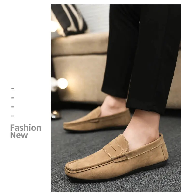 Pair of tan suede driving loafers for men, casual versatile work shoes with stitched detailing