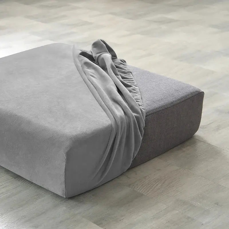 Plush grey sofa slipcover with elastic anti-slip fit for living room furniture