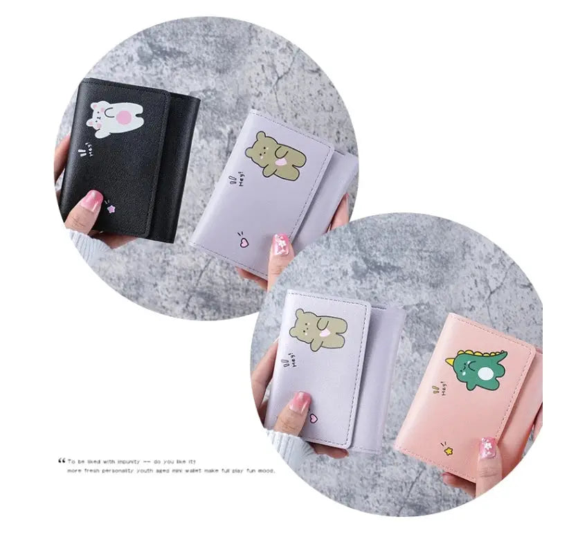 Set of 4 women's short cartoon wallets with animal designs in black, lavender, and pink; card holder and coin purse.