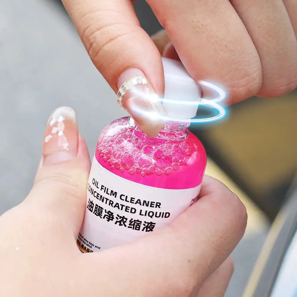 Car glass coating oil film cleaner by Simples Market, pink concentrated liquid in bottle