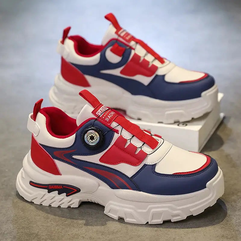 Pair of men's chunky-sole high-top sneakers in white, red, and navy.