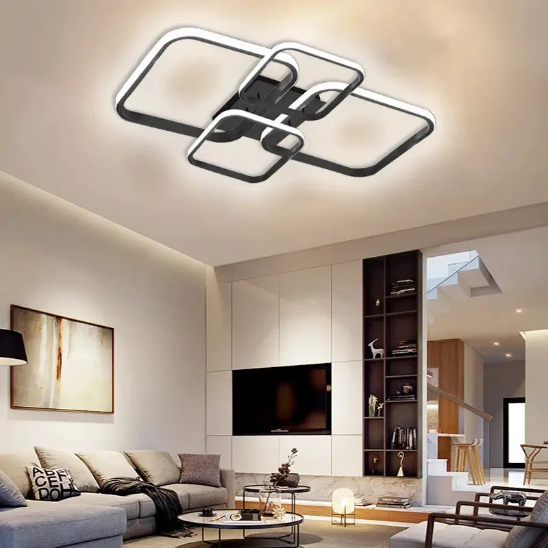 Modern LED ceiling light fixture with four square heads in black and white