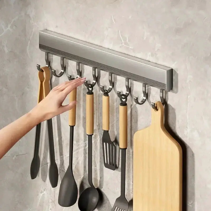 Kitchen utensil rack Simples Market aluminum alloy 8-hook wall-mounted with wooden-handled utensils and a cutting board