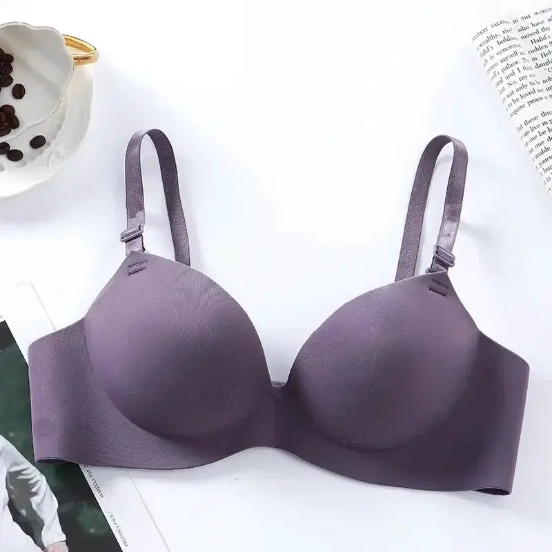 Women's seamless wireless bra in purple with molded cups and adjustable straps