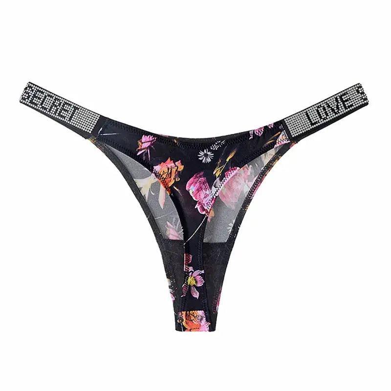 Low-rise floral thong with sheer panels and rhinestone waistband reading SECRET and LOVE